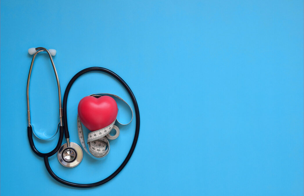 stethoscope with heart on a blue background